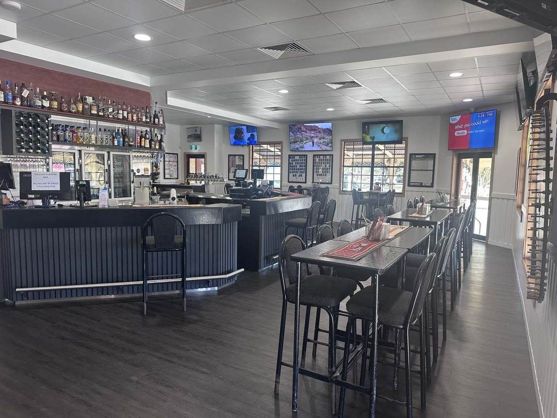 The main bar with taps and stools
